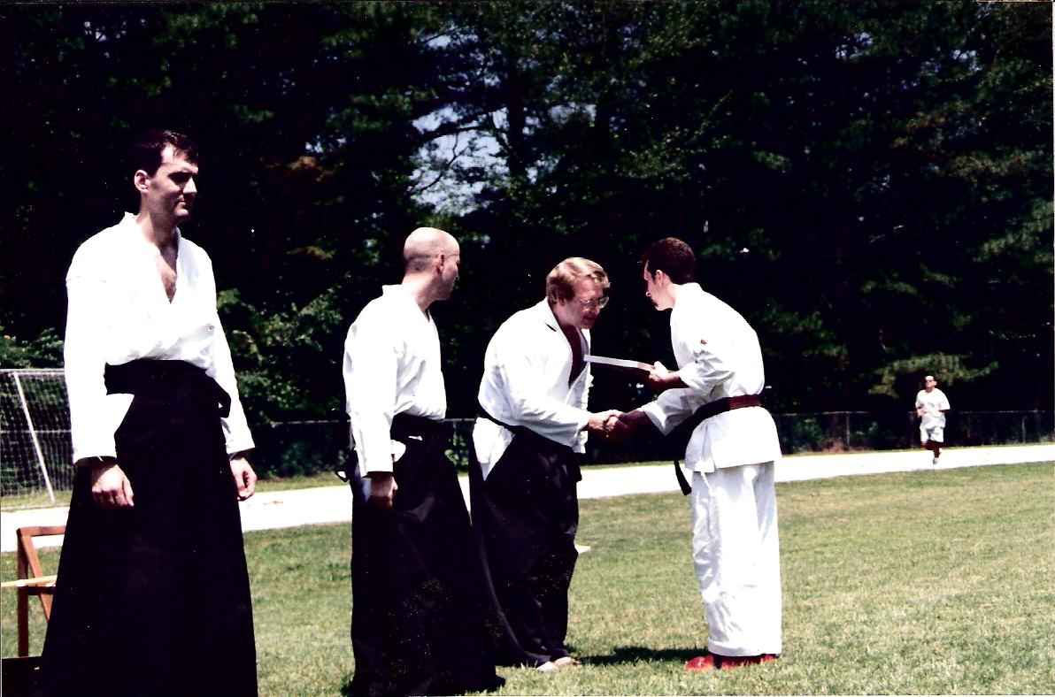 Sensei awarding Rich new belt 1997